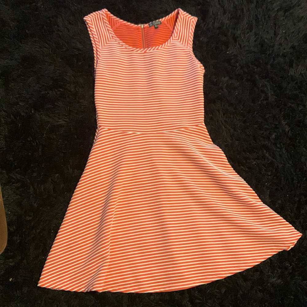 BeBop knee length coral dress with thin white stripes. Size medium.